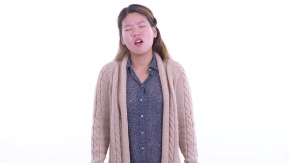 Stressed Young Asian Woman Getting Bad News for Winter