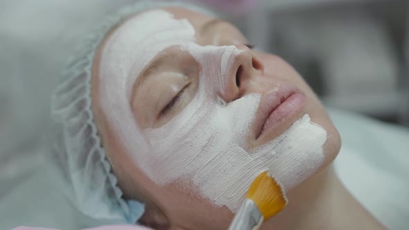 Applying Cosmetic Mask to the Patient's Face