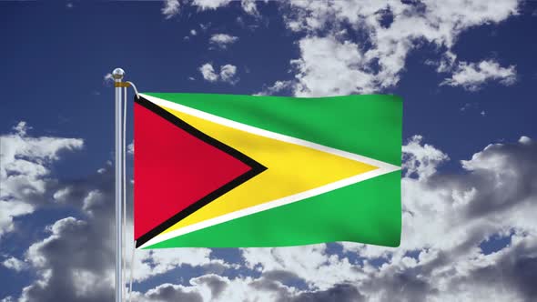 Flag Of Guyana Waving With Blue Sky