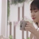 Asian Girl Enjoys The Morning Drink - VideoHive Item for Sale