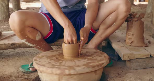 Rural Man Making A Clay Pot