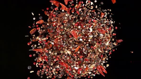 Super Slow Motion Shot of Flying and Rotating Colorful Mix Spices at 1000Fps