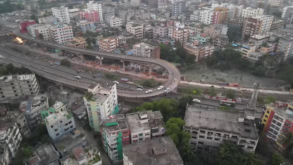 Aerial birdseye view over the tower block apartments and infrastructure of Khilgaon suburb of Dhaka.