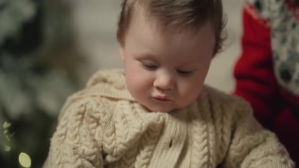 Mom Teaches Baby to Play Guitar at Xmas