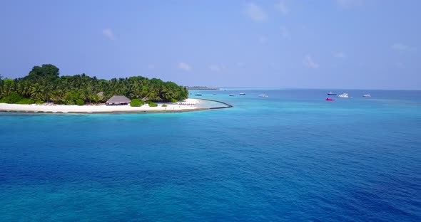 Wide above clean view of a summer white paradise sand beach and blue sea background in best quality 