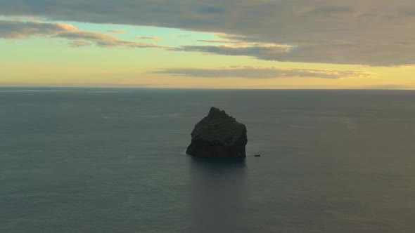 Cliff in Sea at Sunset. Reykjanes Peninsula. Iceland. Aerial View