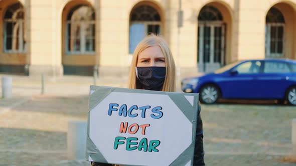 Facts Not Fear Slogan on Protest Walk