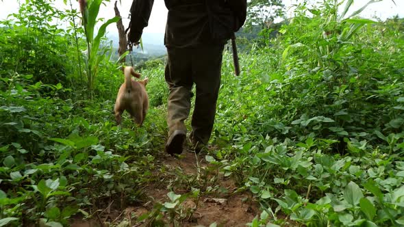 Senior Man Going To Hunt With Dog