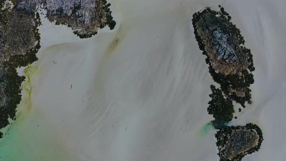 Drone Passover in Shallow Water at Knockvologan on The Isle of Mull