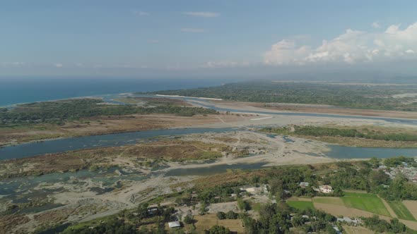 River Flowing Into Sea