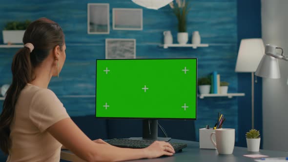 Freelancer Searching the Internet on Green Screen Chroma Key Display