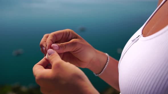 Woman Eating Milky Almond Nuts