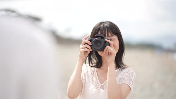 woman taking pictures