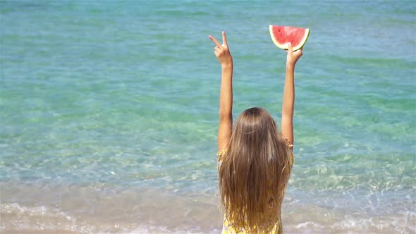 Happy Child on the Sea with Watermelon