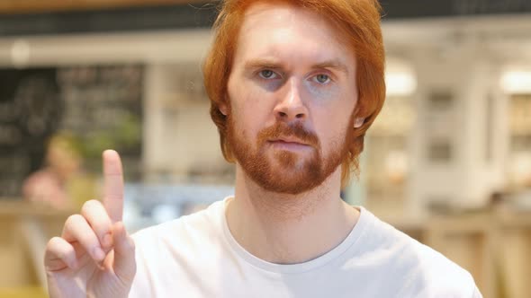 Redhead Beard Man Waving Finger to Refuse, No