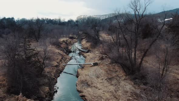 View of a river cutting across a grassland