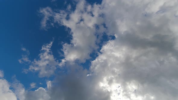 TimeLapse Blue Sunny Sky Loop of White Clouds