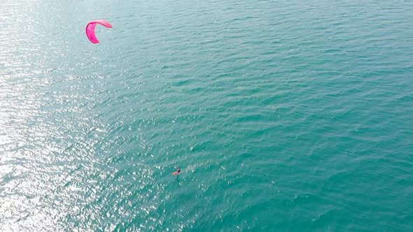 Aerial View of the City Beach and Active People Practicing Kite Surfing and Windsurfing. Kitesurfing