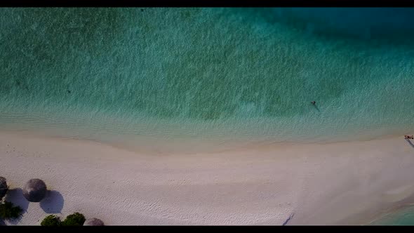 Aerial top view seascape of luxury coastline beach time by aqua blue ocean with bright sandy backgro