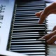Female Hands Playing Piano. A Woman Touches the Keys with Her Fingers - VideoHive Item for Sale