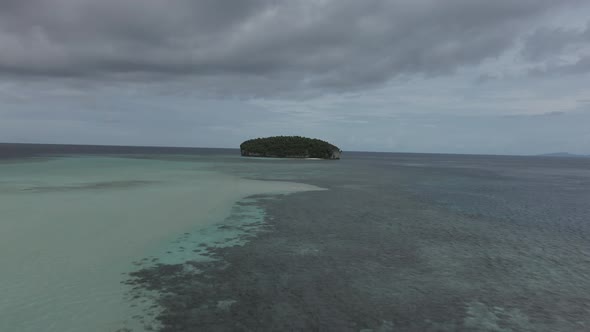 Beautiful Ocean In Kri Island, Raja Ampat. Drone Approaching By Sandy Beach In Turquoise Sea