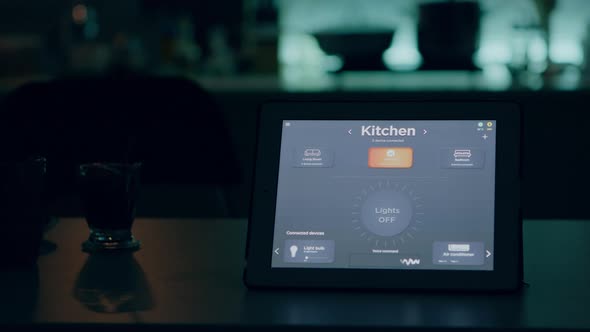 Close Up of Tablet with Wireless Lighting Automation Software Placed on Table