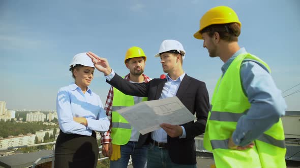 Male Architect Shaking Contractor Hand, Deal Approval, Construction Service