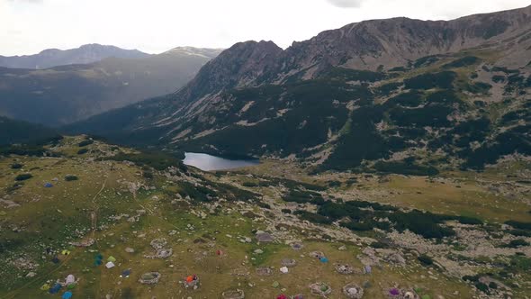 Flying over the top of tents as hikers prepare to summit Peleaga the next day.