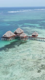 Tanzania  Vertical Video House on Stilts in the Ocean on the Coast of Zanzibar Slow Motion