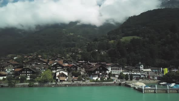 Small Village By the Lake and the Foot of Mountains in Switzerland