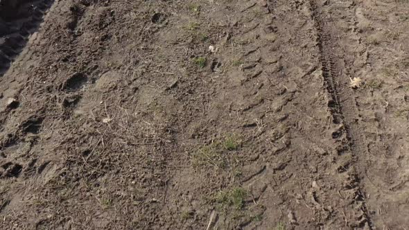 Above the muddy road after rain 4K drone footage