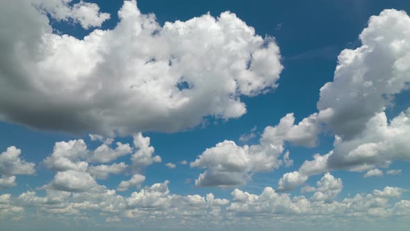 Timelapse of White Puffy Cumulus Clouds Forming on Summer Blue Sky