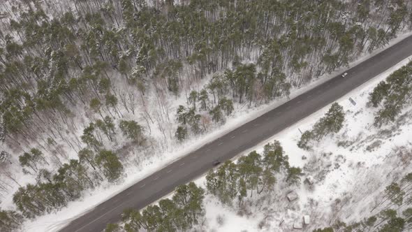 Aerial View Traffic Near The Winter Forest