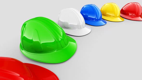 Seamless animation of circular array of colorful safety helmets. Loopable. HD