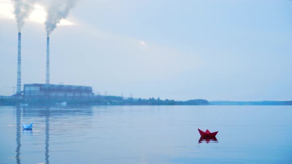 Paper Boats Floating in the River