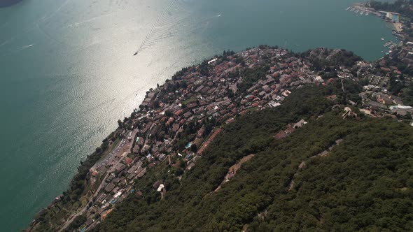 Tilt up, establish Lugano mountain panorama with the monte san salvatore, aerial.