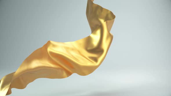 Golden cloth piece of blowing fabric 3d rendered elegant textile.