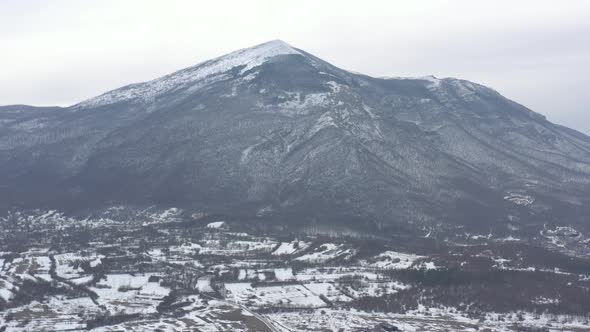 Pyramid shaped mountain Rtanj by the winter day 4K aerial footage