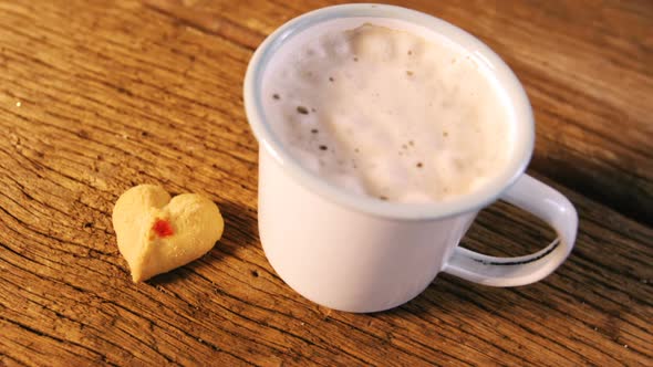 Cup of coffee with cookies