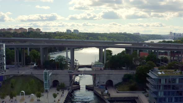 Stockholm, Sweden. Aerial Drone summer view of a lock with bridges, canal and bay