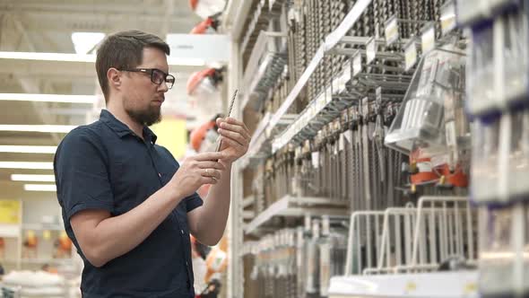 Man in a Hardware Store