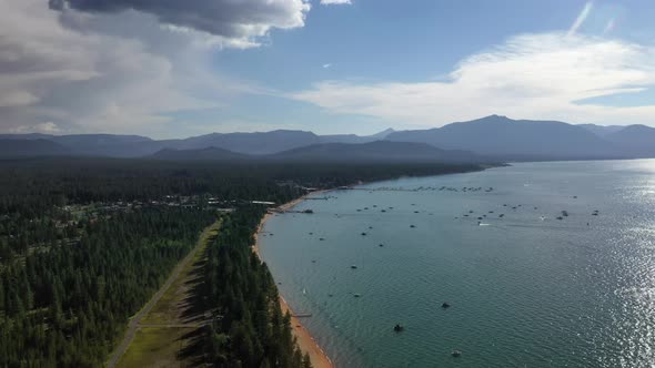 Aerial Panorama Of South Lake Tahoe Over Clouded Sky In California, USA.