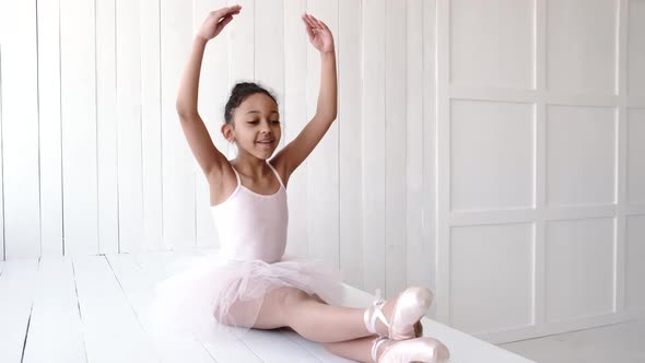 African Amercan Little Girl at Ballet Class in Studio