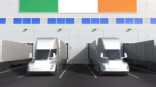 Semitrailer Trucks at Warehouse Loading Dock with Flag of IRELAND