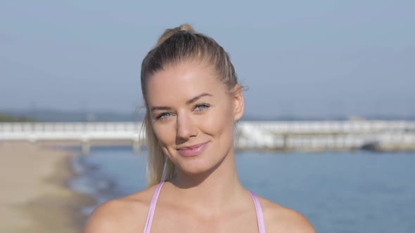 Portrait of a beautiful young woman with a healthy smile