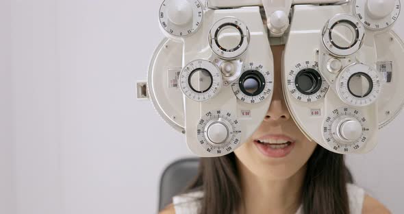 Woman Is Visiting Oculist in Clinic