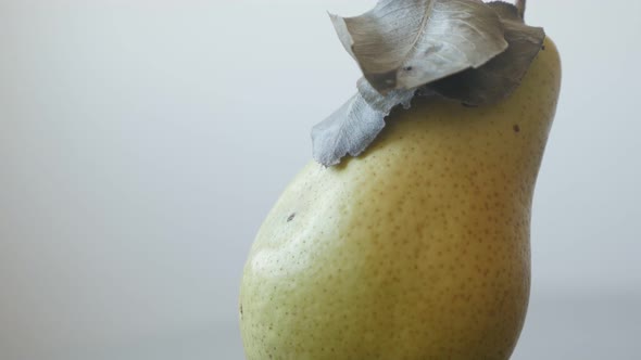 Details of  fruit from genus Pyrus 4K 2160p UltraHD tilting footage - Close-up of yellow organic pea