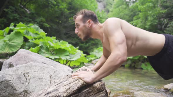 Man doing sports in the forest.