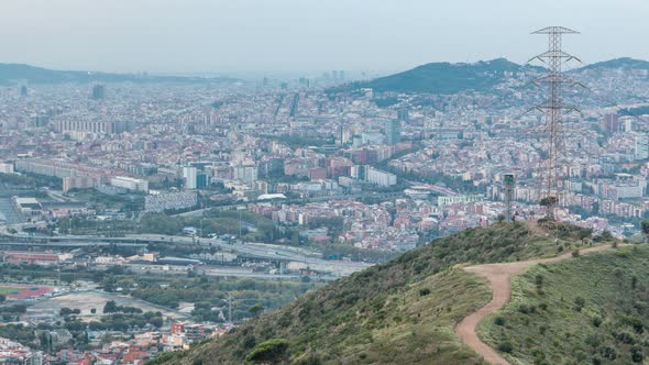 Barcelona and Badalona Skyline with Roofs of Houses and Sea on the Horizon at Evening Timelapse