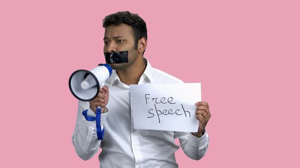 Portrait of Male Protester with Taped Mouth